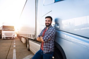Portrait,of,young,caucasian,bearded,trucker,with,arms,crossed,standing