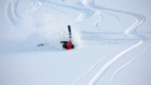 A skier losing control on the slopes and needing the services of an experienced ski accident attorney in colorado