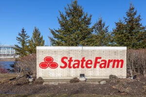 State farm sign and trees