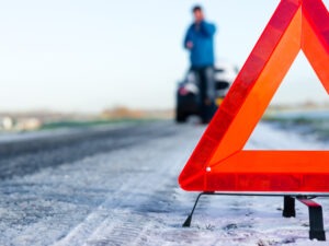 Emergency triangle on snowy ground