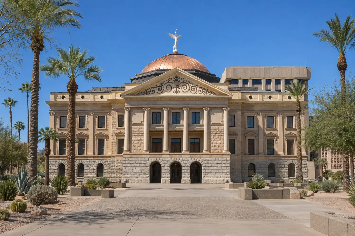 Arizona state capitol building in Phoenix under a clear desert sky