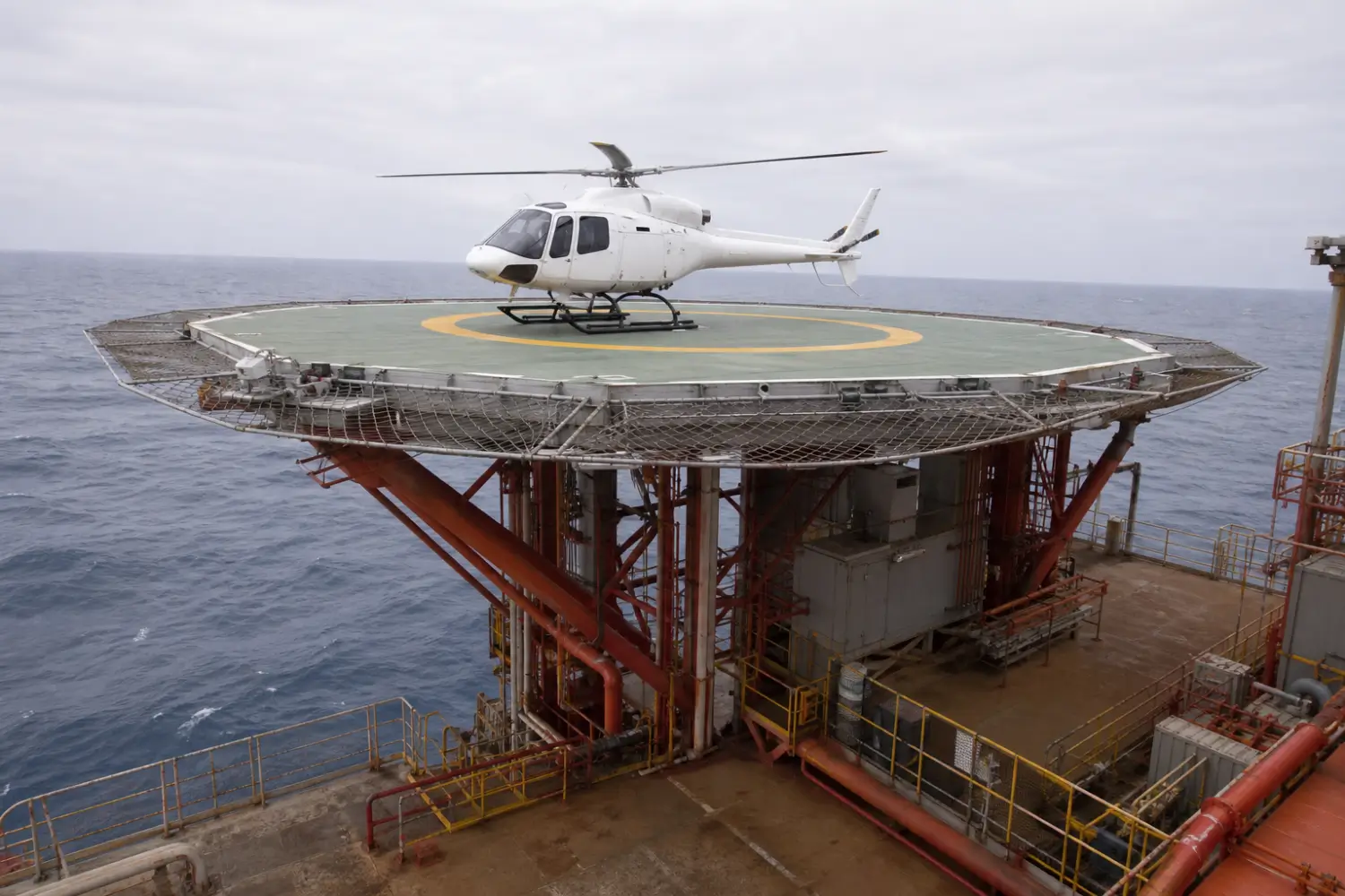 Helicopter on the helideck of an offshore oil platform